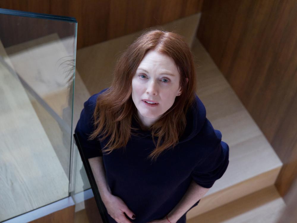 Every morning, Ingrid (Julianne Moore) looks up the staircase at her friend Martha's door. If it's closed, Martha has said that means she has taken a lethal pill and is now dead.