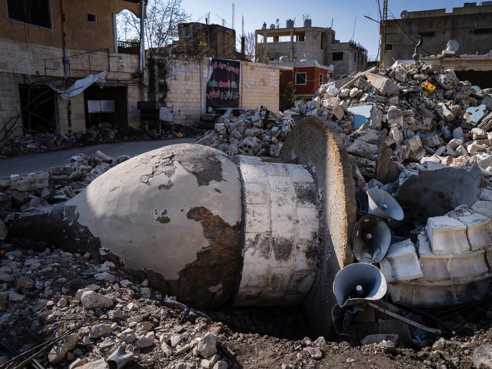 The white marble minaret of a 250-year-old mosque lies on its side in southern Lebanon, following an Israeli strike.