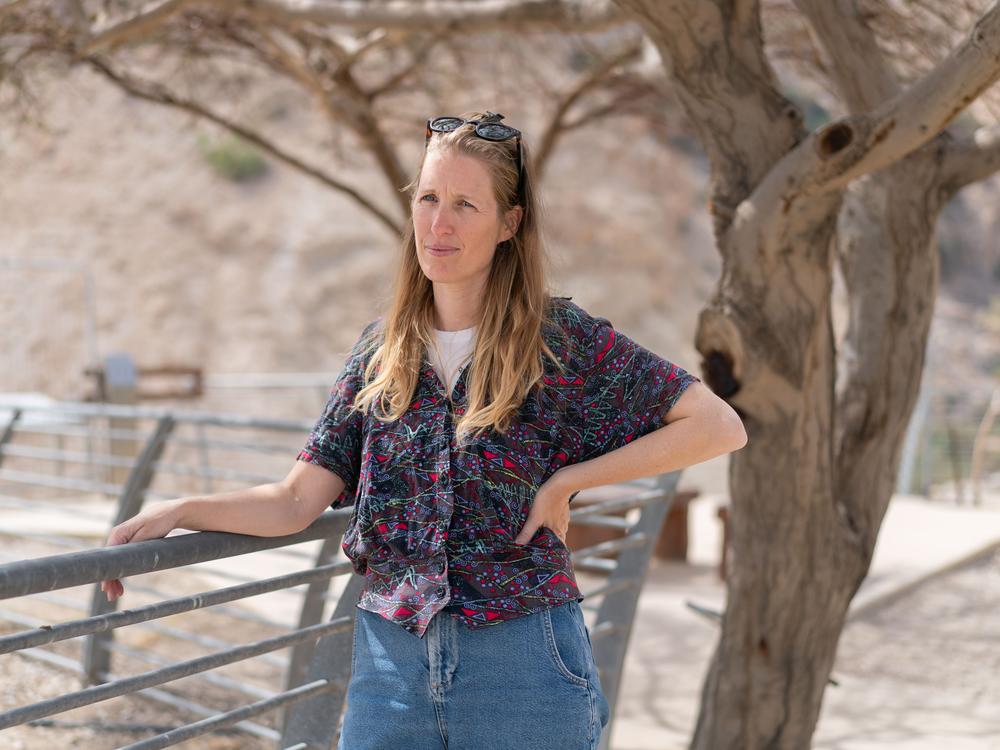 Noam Erely, the principal of the temporary elementary school for the displaced residents of Be'eri, stands outside a school set up in a complex usually used to teach visiting classes about nature in the Dead Sea area.