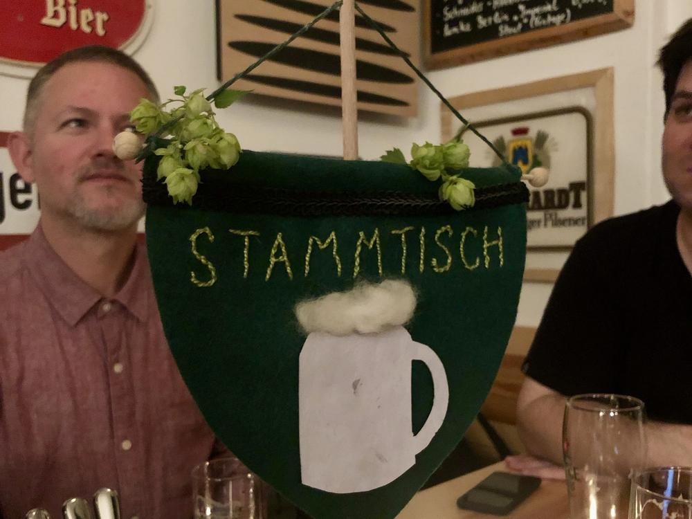 A view of the Stammtisch flag at the gathering the author attended in Berlin in 2019.