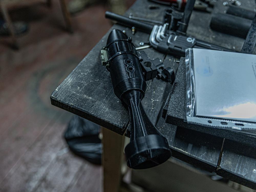 A 3D-printed casing for a strike drone munition, fabricated at a secret drone workshop operating as part of Ukraine's 68th Separate Jäger Brigade in a village outside Pokrovsk, Ukraine.  Weapons like these have helped slow Russia's advance.