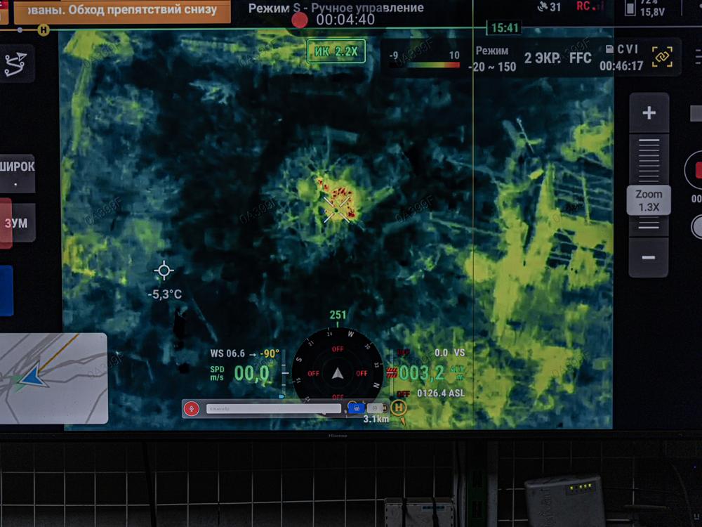 Image on the live stream screen of a night vision drone operating near Pokrovsk, Ukraine. Enemy Russian target detected.