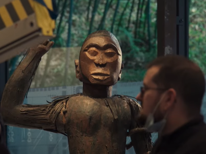 A wooden statue of King Ghezo, who led Dahomey in the 19th century, is given a voice of its own in <em>Dahomey</em>.