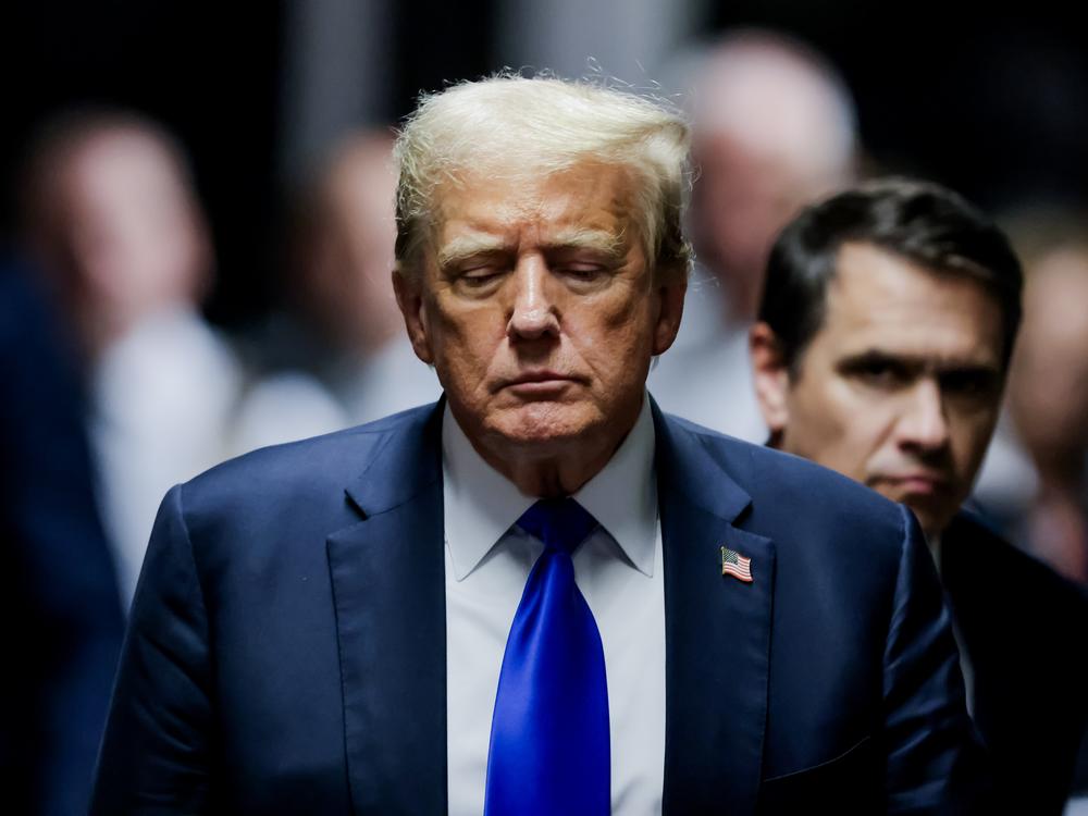 Former President Donald Trump departs the courtroom after being found guilty on all 34 counts in his hush money trial at Manhattan Criminal Court on May 30 in New York City.