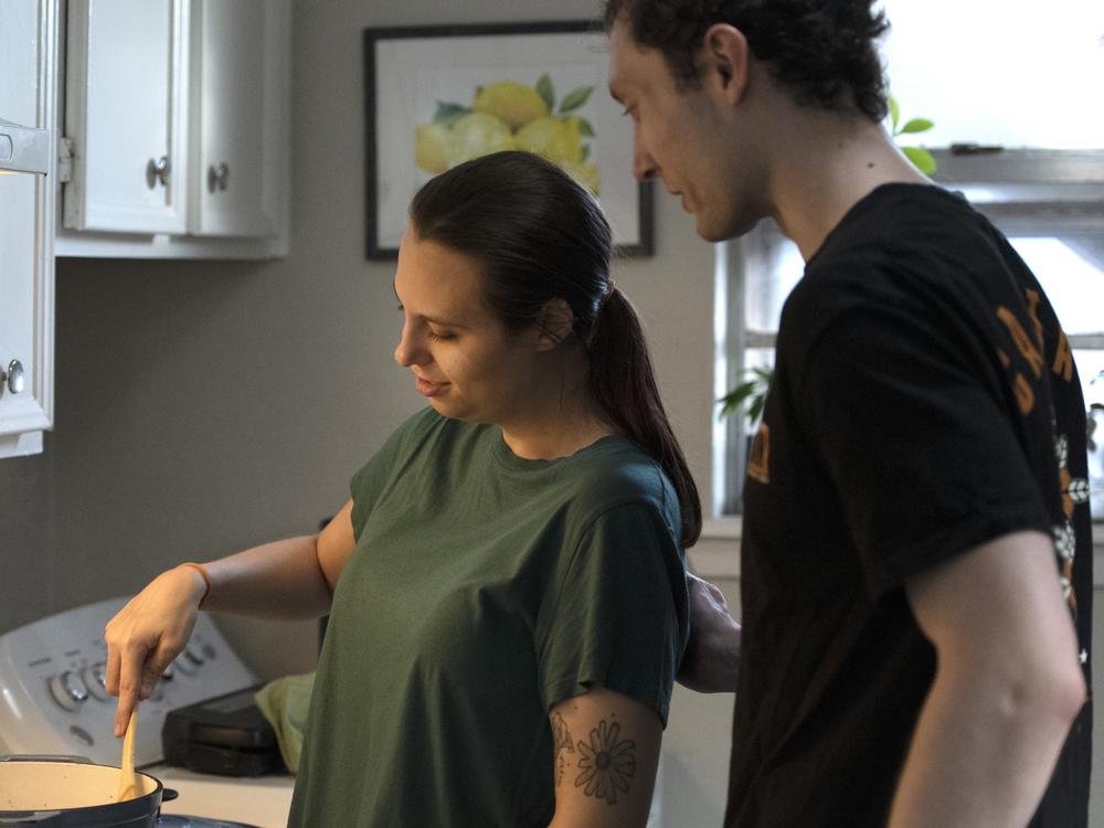 Glick and Heath make vegetable soup together. The responsibilities of caregiving can hit young people harder than older adults. Heath not only worries about when Glick's next bout of illness will strike, but also about her long-term needs.