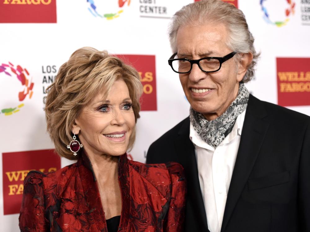 Jane Fonda, left, and Richard Perry pose for a photo at the Los Angeles LGBT Center's 46th Anniversary Gala Vanguard Awards at the Hyatt Regency Century Plaza in Los Angeles, Nov. 7, 2015.