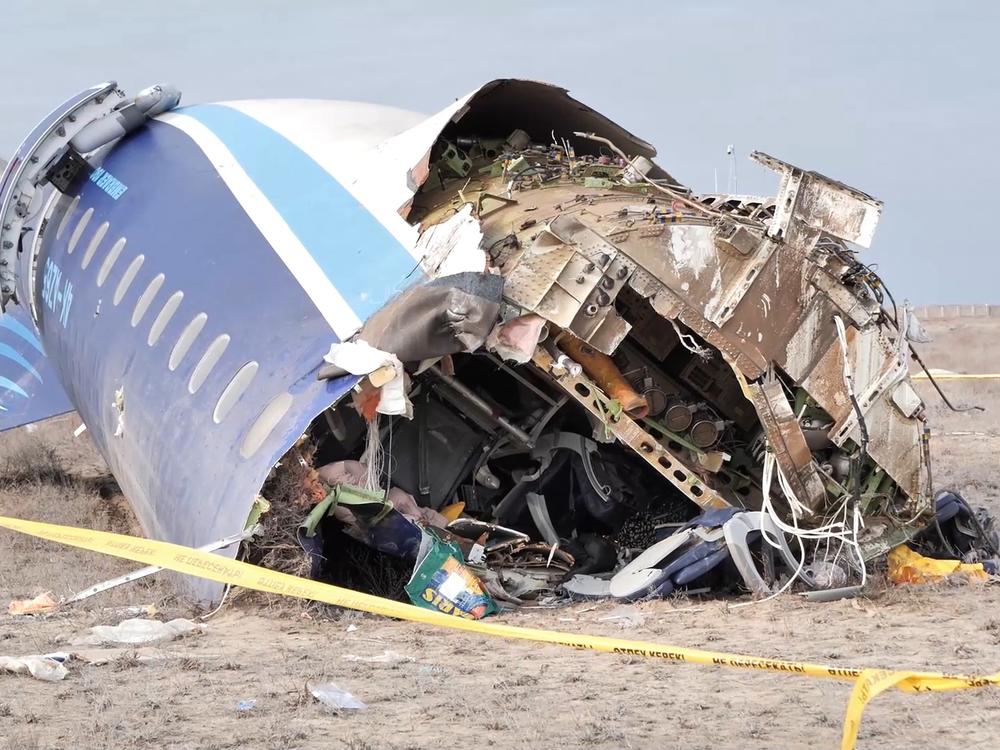 In this photo taken from a video released by the administration of Mangystau region, the wreckage of Azerbaijan Airlines Embraer 190 lies on the ground near the airport of Aktau, Kazakhstan, on Wednesday.