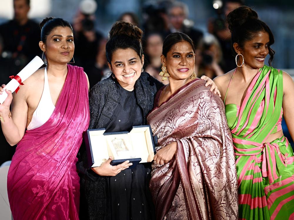 <em>All We Imagine as Light,</em> a film about working class women in Mumbai, won the Grand Prix at the Cannes Film Festival this year. From left: actor Divya Prabha, director Payal Kapadia, and actors Chhaya Kadam and Kani Kusruti pose during the Cannes closing ceremony.