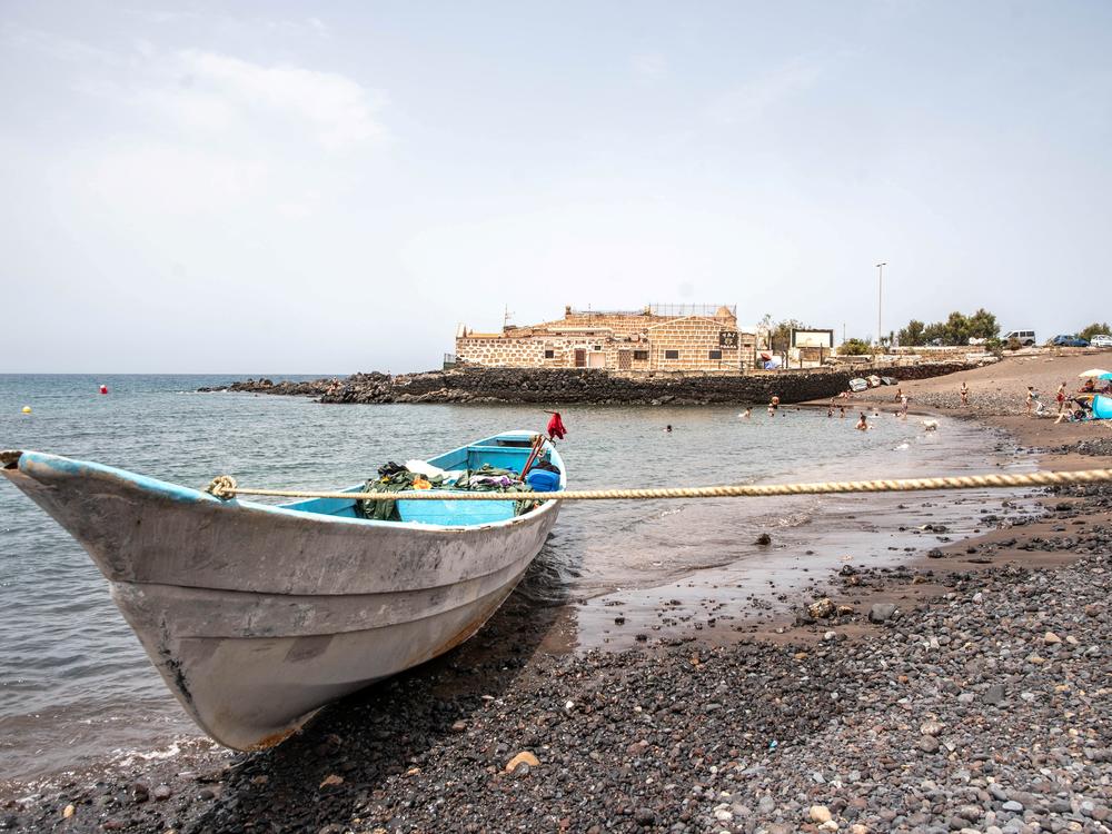 This photograph shows a boat that arrived with 41 people on board, including two minors, on the Canary island of Tenerife in July 2023.
