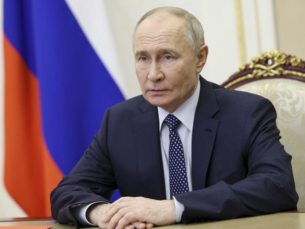 Russian President Vladimir Putin chairs a Security Council meeting via videoconference at the Kremlin in Moscow, on Saturday.
