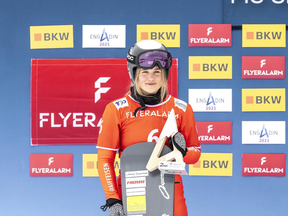 Sophie Hediger takes 2nd place during the FIS Snowboard Cross World Cup Men's and Women's Snowboard Cross on Jan. 26, 2024, in St. Moritz, Switzerland.