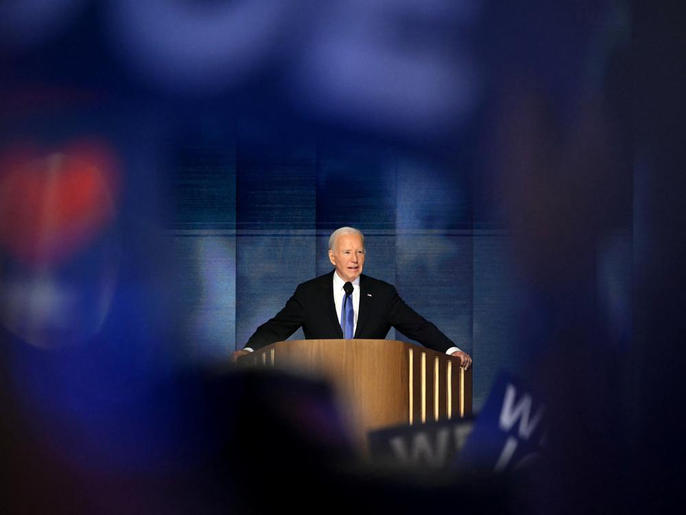 US President Biden speaks on the first day of the Democratic National Convention at the United Center in Chicago on Aug. 19.