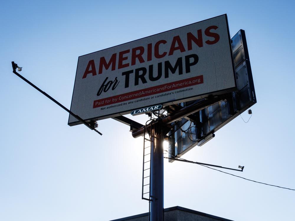 An electronic billboard shows an 