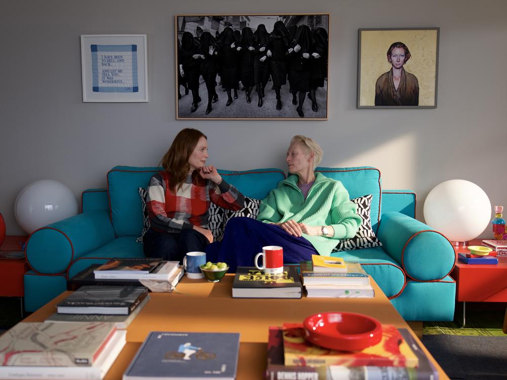 Ingrid (Julianne Moore) accompanies her friend Martha (Tilda Swinton) as Martha faces terminal cancer in <em>The Room Next Door. </em>