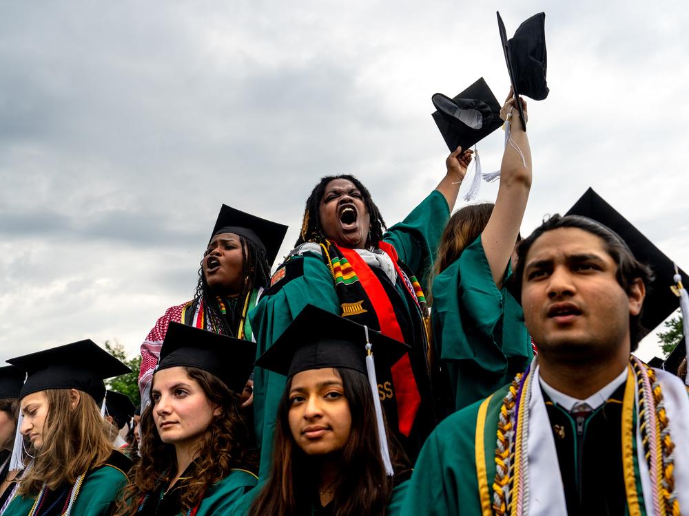 Graduating students protests remarks by Washington University Chancellor Andrew Martin on May 13 at the university's campus near Clayton, Mo. Full story <a href=