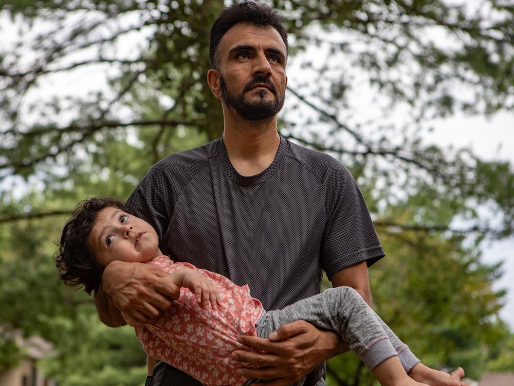 Shafi Amani and his daughter, Yousra, 3, in Alexandria, Va., on Aug. 3, 2023.