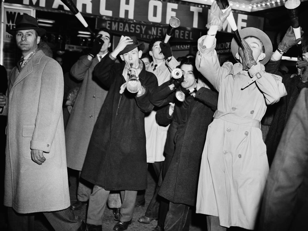 Revelers celebrate the new year on Jan. 1, 1942, in Times Square. Its New Year's Eve ball drop attracts millions of viewers — at home and in the streets of New York City — every year.