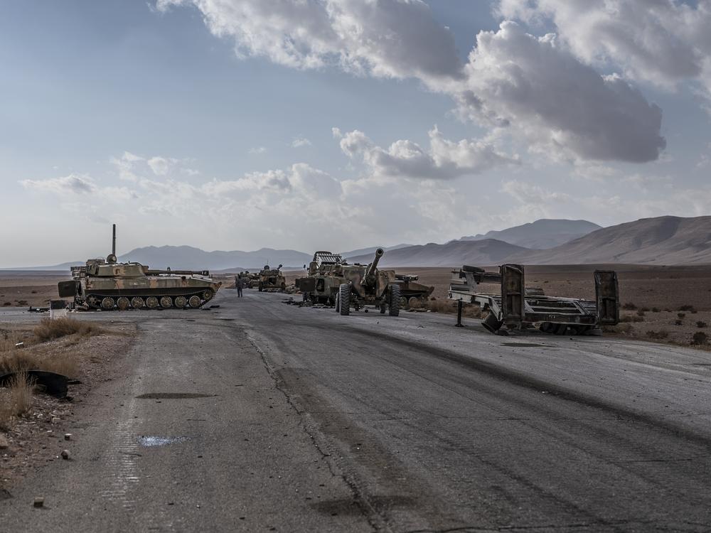 Syrian regime tanks sit abandoned on the Damascus-Baghdad highway in Syria, Dec. 13. Most regime soldiers retreated rather than fight opposition forces this month.<br><br>
