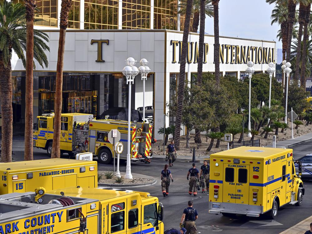 Fire vehicles surround the valet area where a Tesla Cybertruck caught fire at the Trump International Hotel in Las Vegas on Jan. 1.
