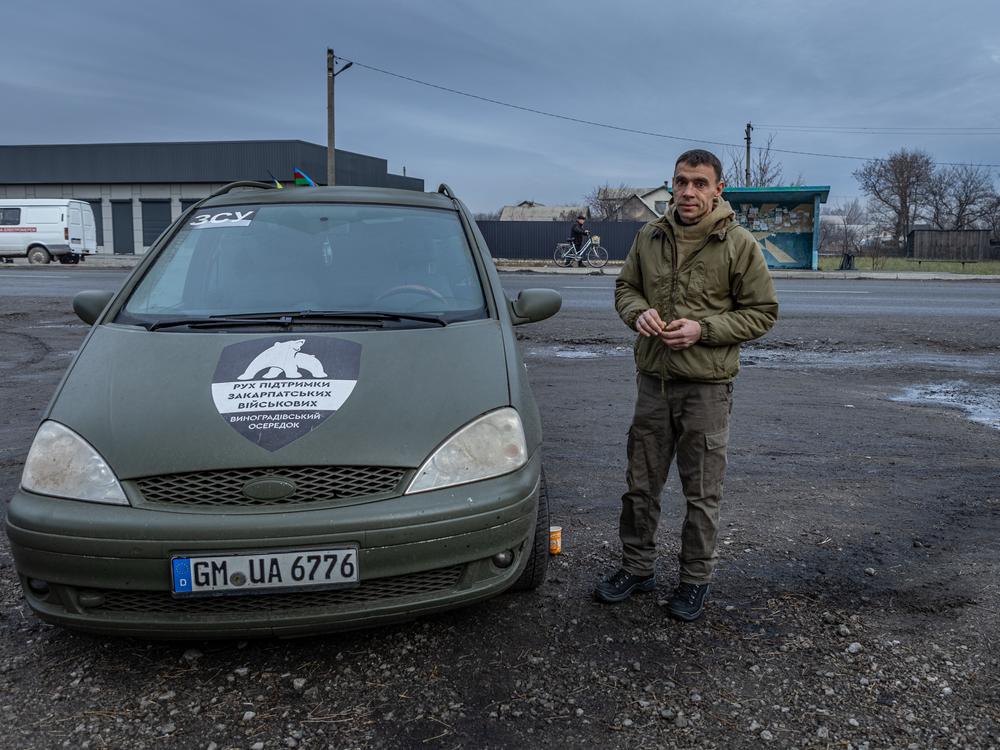 Vasyl Pipa, 41, is acting head of the White Angels evacuation police unit that operates in the Pokrovsk district. His team works throughout the city and its embattled suburbs, encouraging families to join the wave of displaced Ukrainians driven from their homes by Russia's advance. He is photographed here in Mykolaivka, a village near Pokrovsk.