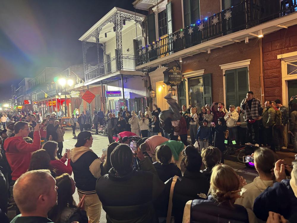 Crowds return to a reopened Bourbon Street on Jan. 2, 2025, the day after the deadly truck attack in New Orleans.