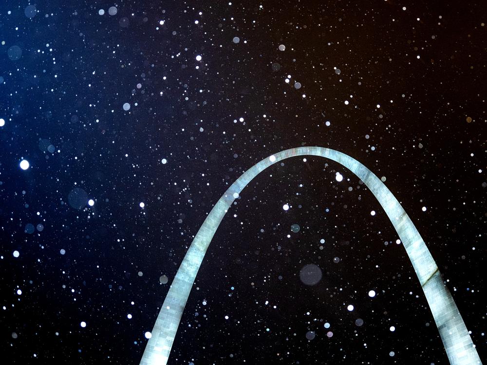 Snow falls on the Gateway Arch National Park during the waning hours of Saturday, January 4, 2025, in downtown St. Louis. Snow and ice are expected to pummel the Midwest — and notably Missouri — as Winter Storm Blair makes its way across the country.
