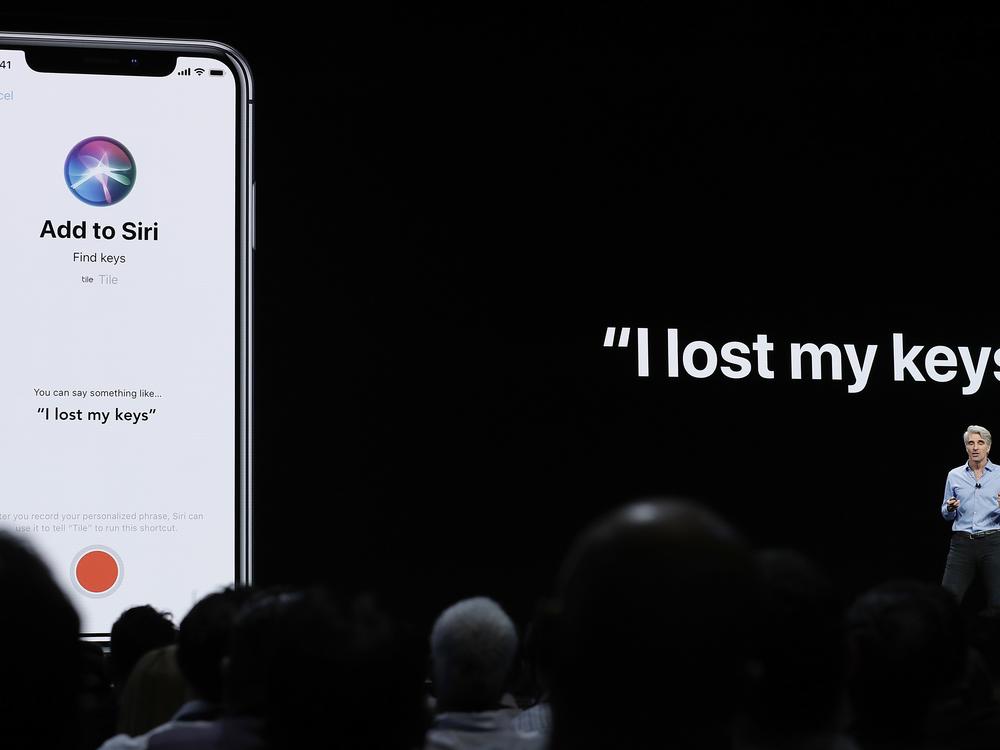 Craig Federighi, Apple's senior vice president of Software Engineering, speaks about Siri during an announcement of new products at the Apple Worldwide Developers Conference in San Jose, Calif., June 4, 2018.