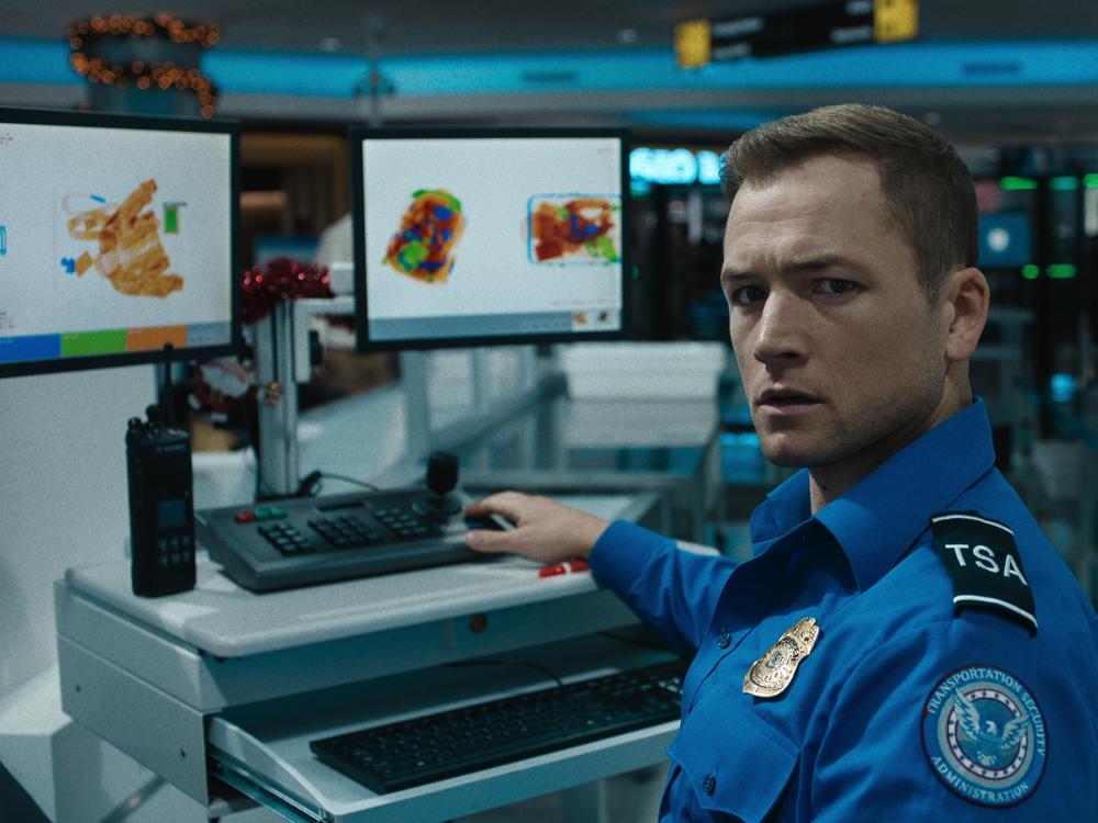 Taron Egerton as Ethan Kopek in <em>Carry-On</em>.