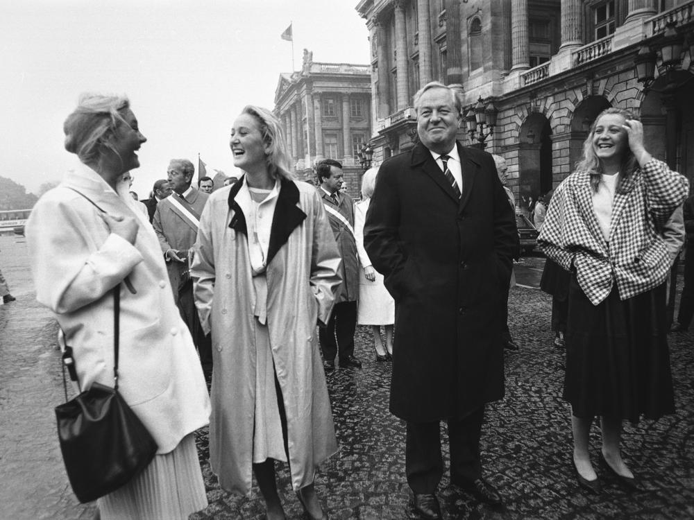 Le Pen leads a march to the statue of Joan of Arc with his three daughters Marie Caroline, Yann and Marine Le Pen, on May 12, 1985. (AP Photo/Herve Merliac, File)