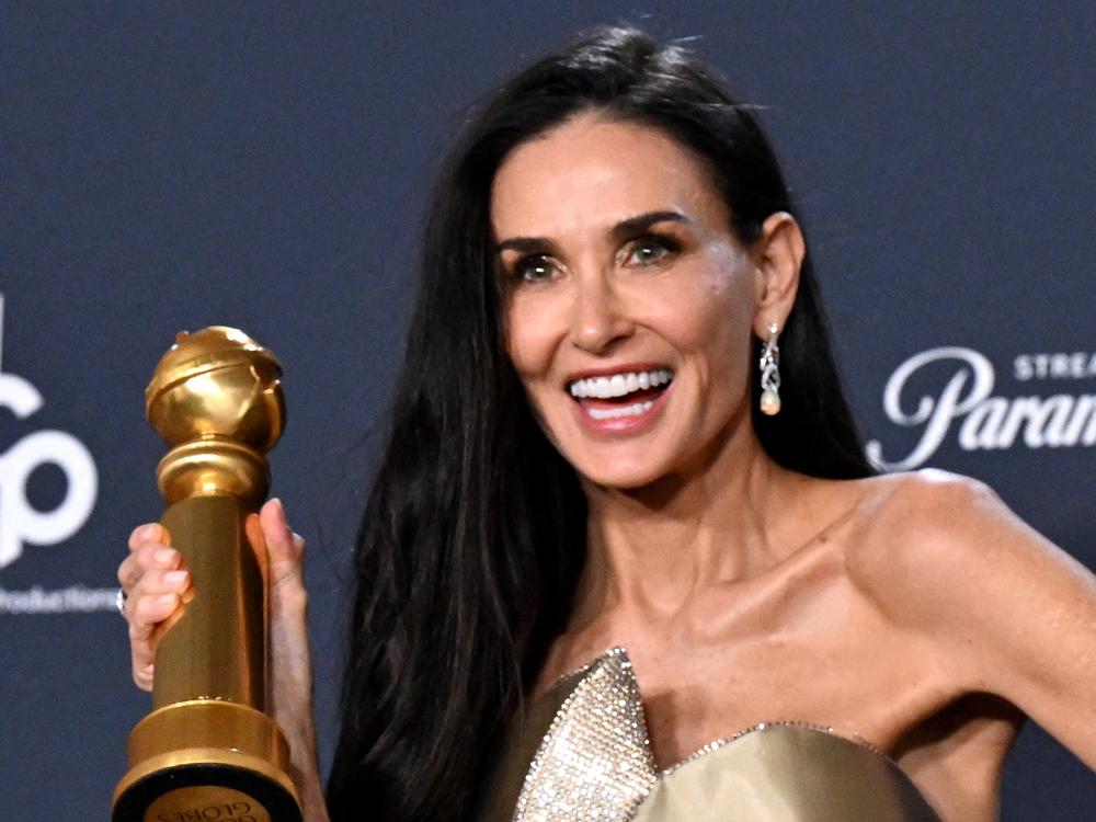 Demi Moore poses in the press room during the 82nd annual Golden Globe Awards on Sunday night.