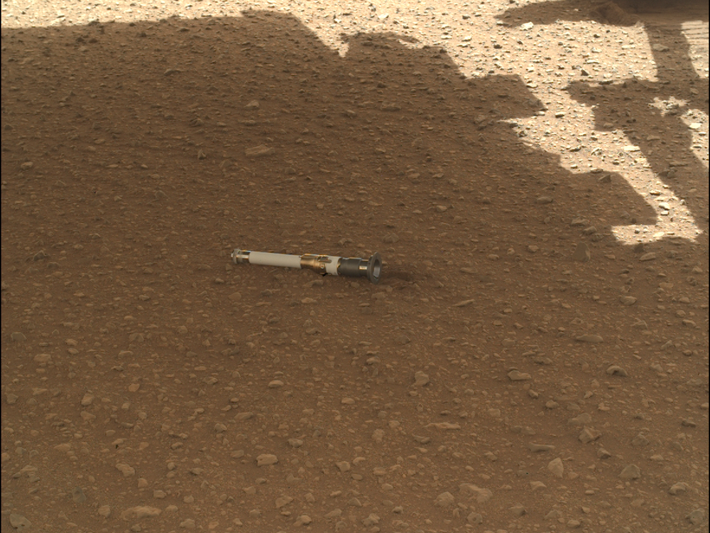 Once the Mars rover Perseverance team confirmed the first sample tube was on the surface, they checked to be sure that the tube was out of the wheels' path.<br>