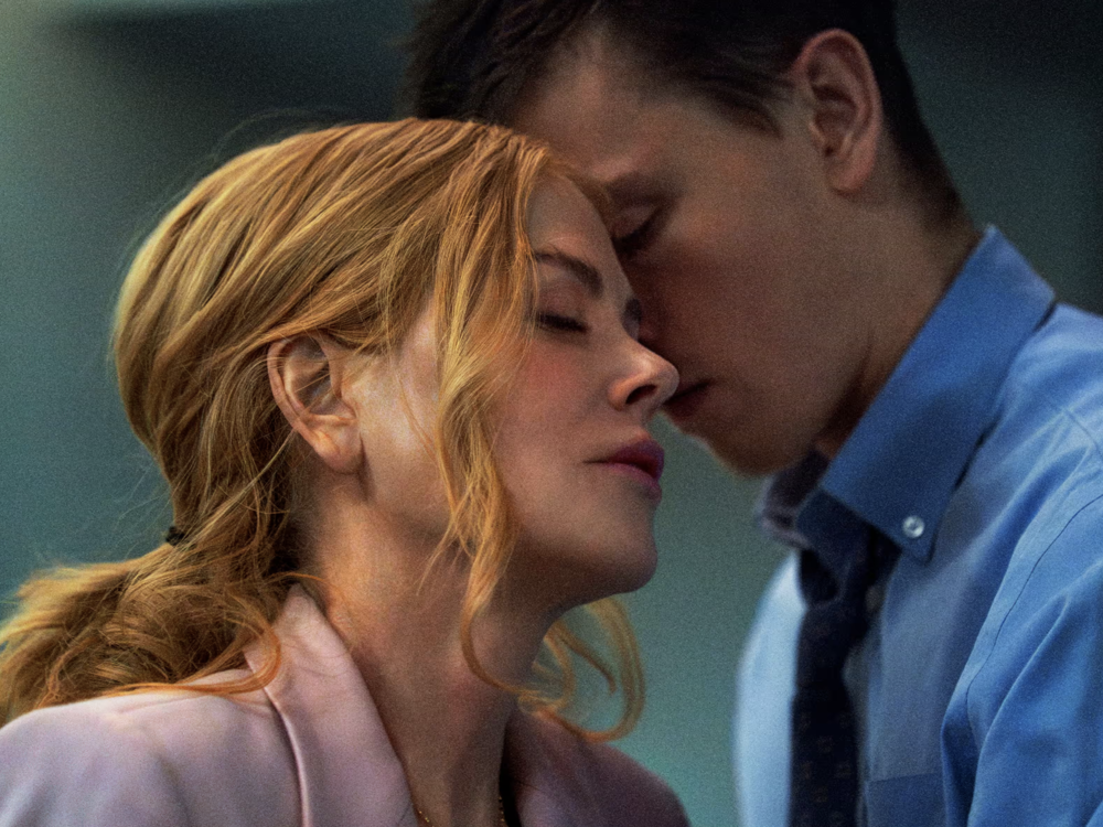Nicole Kidman plays the CEO of a high-tech shipping company, and Harris Dickinson is her intern, in <em>Babygirl</em>.