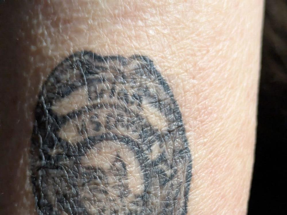 Gladys Sicknick's son, Brian, served in the U.S. Capitol Police and was assaulted with pepper spray on Jan. 6, 2021. He died the following day. After his death, Gladys got a tattoo of his badge on her forearm.