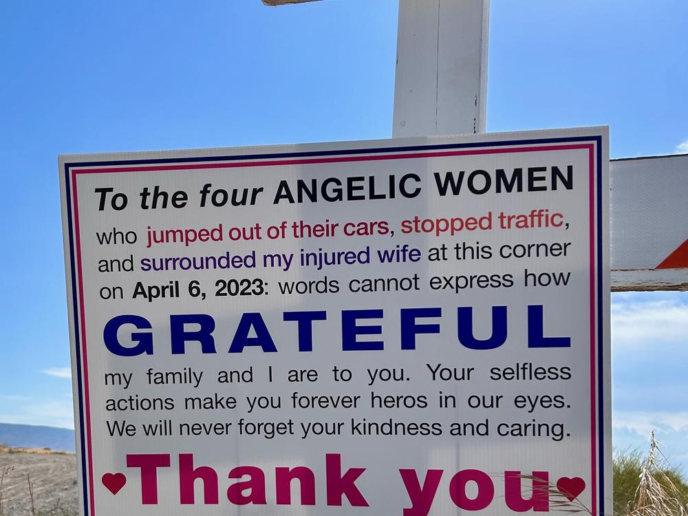A few months after the bike accident, Charlie Essers made a large sign (above) and put it on the street where the four women helped his wife.