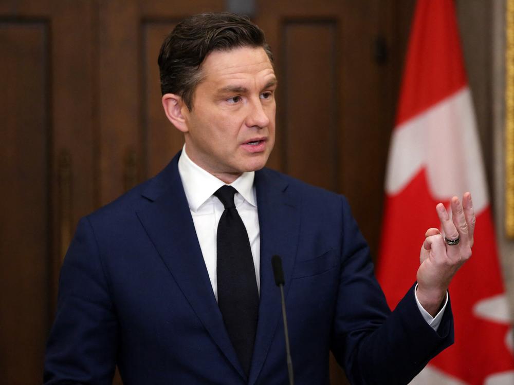 Conservative Party leader Pierre Poilievre has built a sizeable lead in the race to be Canada's next prime minister. He's seen here in December, speaking at a news conference in Ottawa.