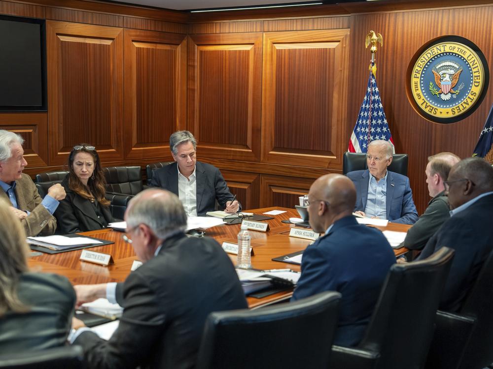 President Biden and members of his national security team receive an update on an ongoing airborne attack on Israel from Iran, as they meet in the Situation Room of the White House in Washington, Saturday, April 13, 2024. From left to right, facing Biden are, Central Intelligence Agency Director William Burns; Avril Haines, Director of National Intelligence; Secretary of State Antony Blinken and National Security Advisor Jake Sullivan.
