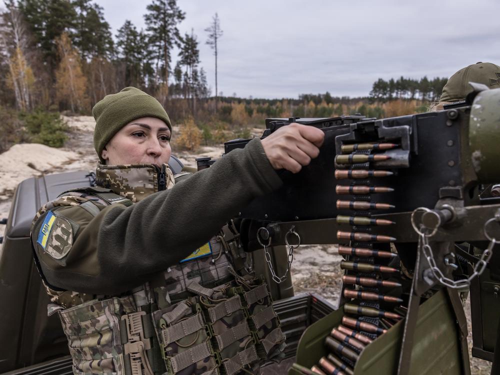 Tetiana, whose husband and brother were killed during the Russian occupation of the Kyiv suburbs early in the war, loads the Maxim machine gun that's used to shoot down Russian drones. She says being part of the women's air defense unit has helped heal her grief and trauma.
