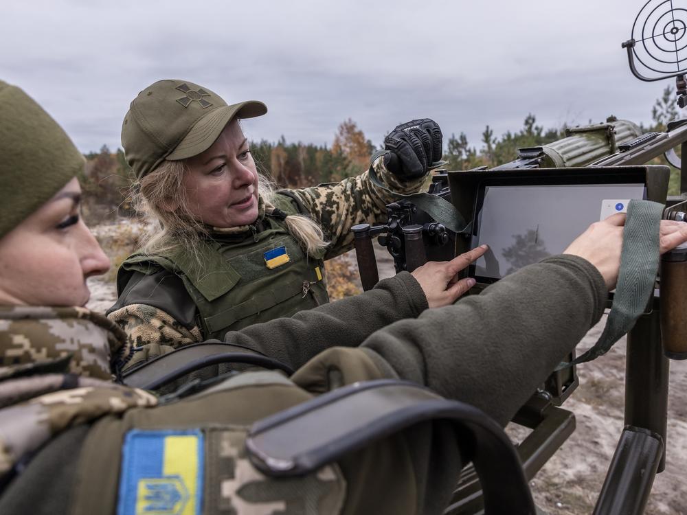 Tetiana (left) and Olena, members of the female air defense unit known as the 