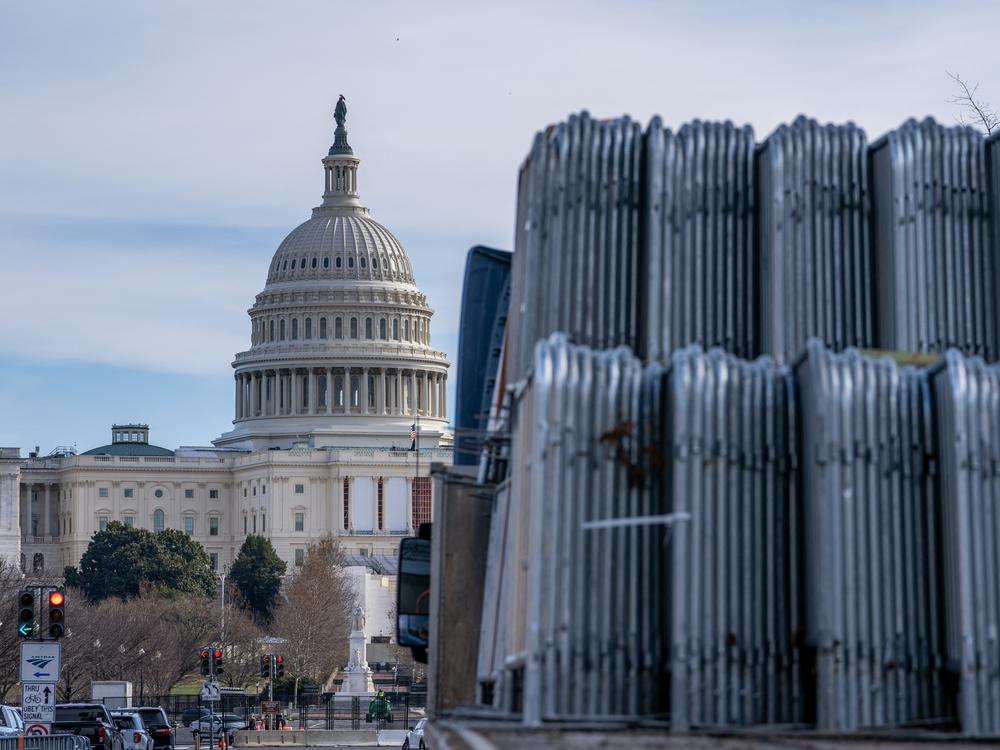 Security fencing is stacked Sunday near the U.S. Capitol ahead of the Jan. 6 certification of the 2024 presidential election.