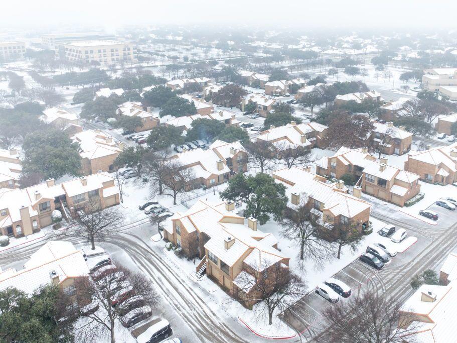 Snow fell across northern Texas, including in Plano, Texas, Thursday as a major winter storm began moving across the southern U.S.