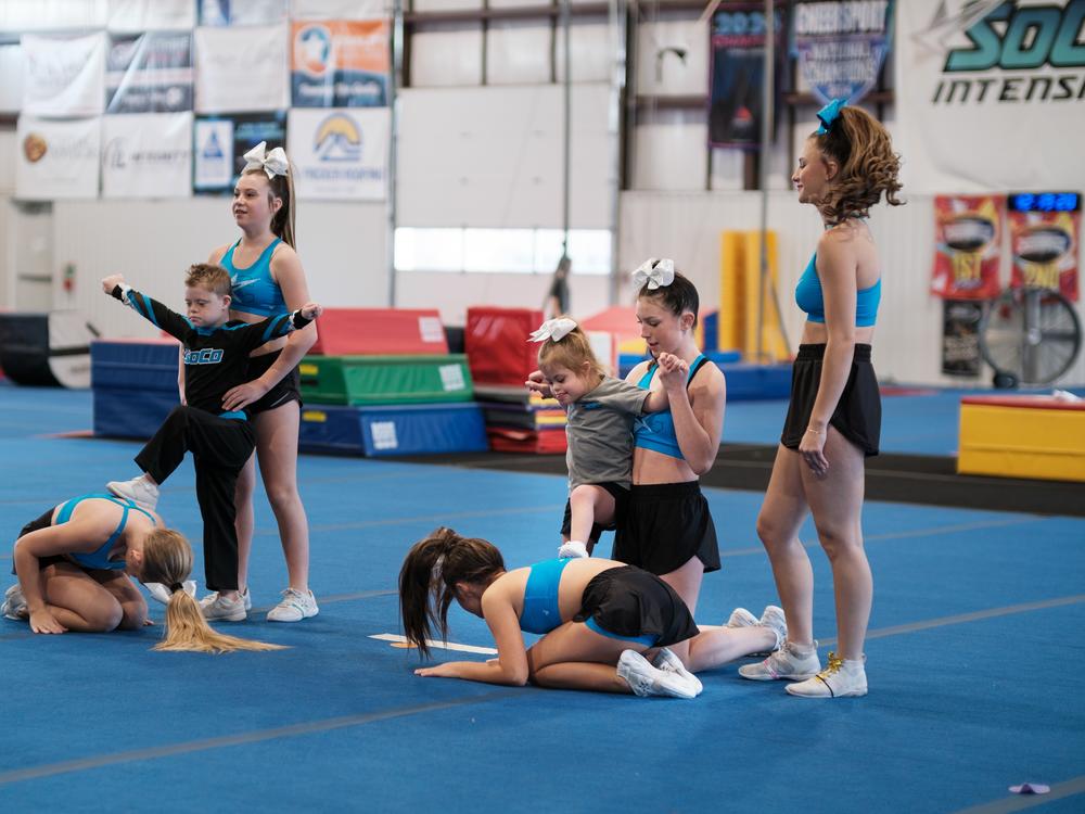 At SoCo Intensity Cheer, students with and without disabilities work together on routines. Adaline gets to work closely with her cousin and peer buddy Zoey Rohrig while at practice. Adaline loves cheer and repeatedly asks to see other teams' stunts 