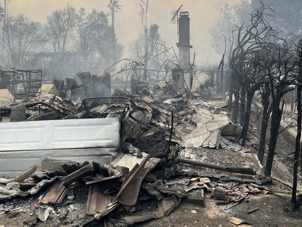 A photo of Victor and Shari Shaw's childhood home in Altadena, Calif., in the aftermath of the Eaton fire.