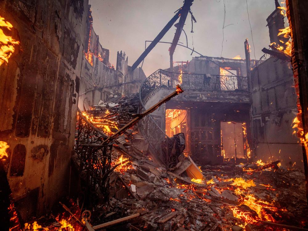 Tuesday, Jan. 7: The Palisades Fire engulfs homes in the Pacific Palisades neighborhood of Los Angeles.