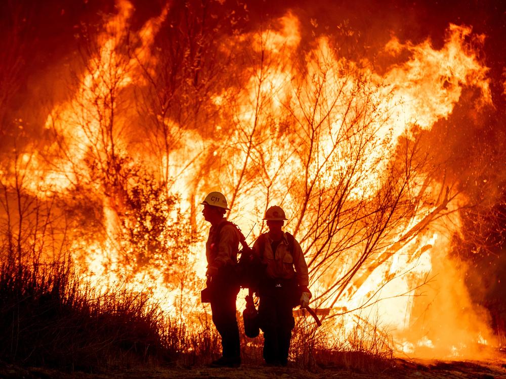 Thursday, Jan. 9: Fire crews battle the Kenneth Fire in the West Hills section of Los Angeles.