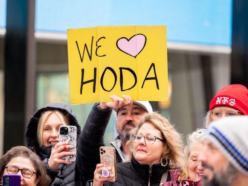 Fans show their love for Hoda Kotb on the Today Show Plaza on Dec. 3, 2024.
