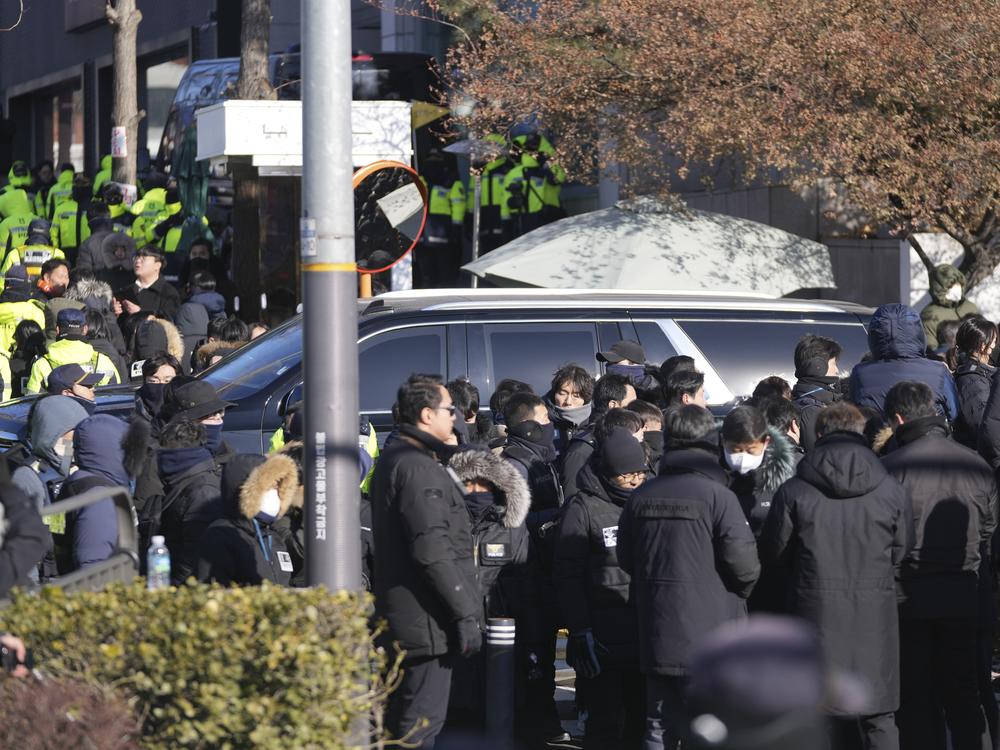 One of motorcade for impeached South Korean President Yoon Suk Yeol leaves for the Corruption Investigation Office for High-ranking Officials from the gate of the presidential residence in Seoul, South Korea on Wednesday.