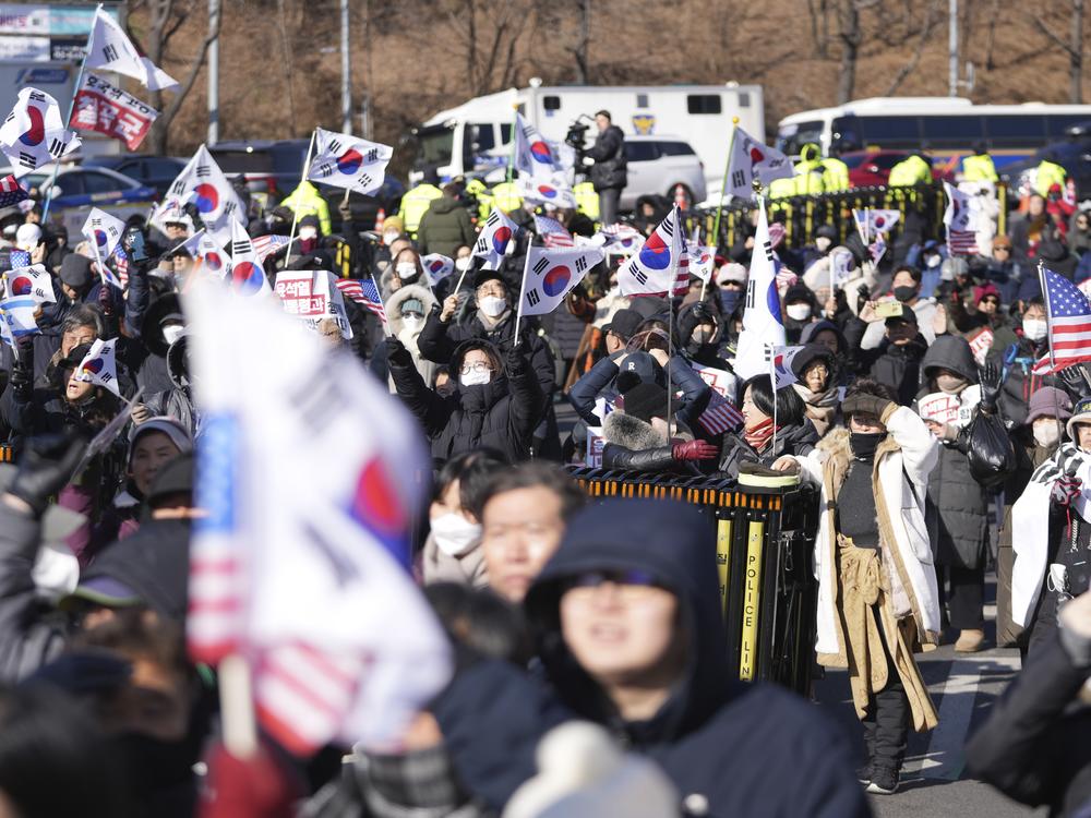 Supporters of impeached South Korean President Yoon Suk Yeol stage a rally to oppose his impeachment near the presidential residence in Seoul, South Korea on Wednesday.