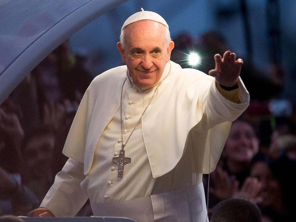 Pope Francis waves from the Popemobile in Rio de Janeiro, Brazil.