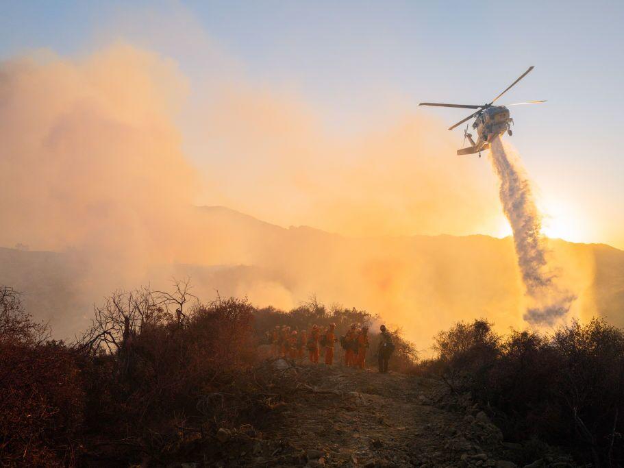 In the early days of the firefight helicopters and planes that are key to dropping water could not fly because of hurricane-force winds.