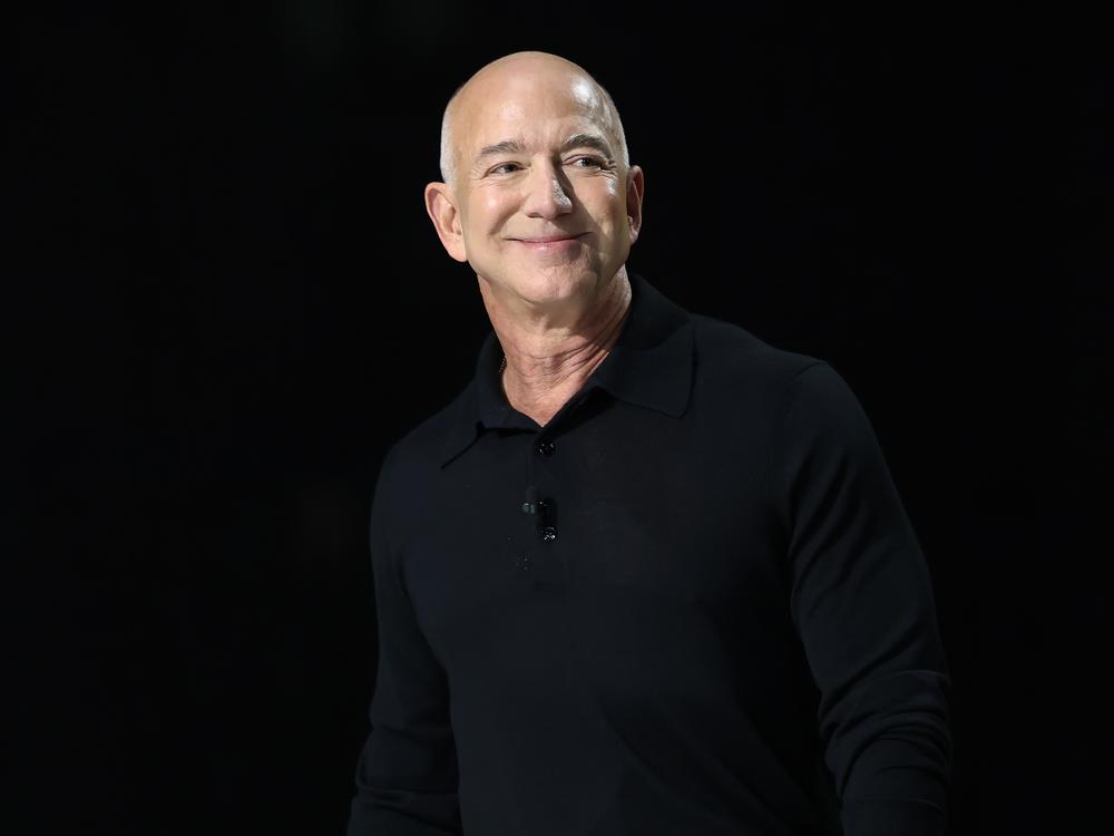 Billionaire Jeff Bezos, who owns <em>The Washington Post</em>, spoke during the <em>New York Times</em> DealBook summit in December. 